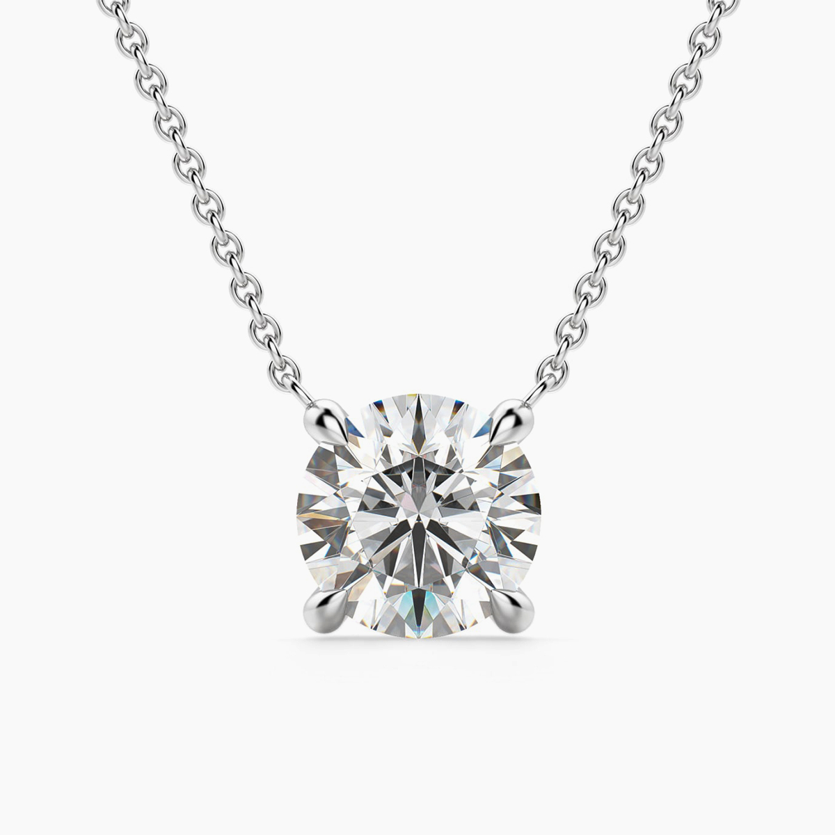 prong solitaire pendant with platinum metal and round shape diamond