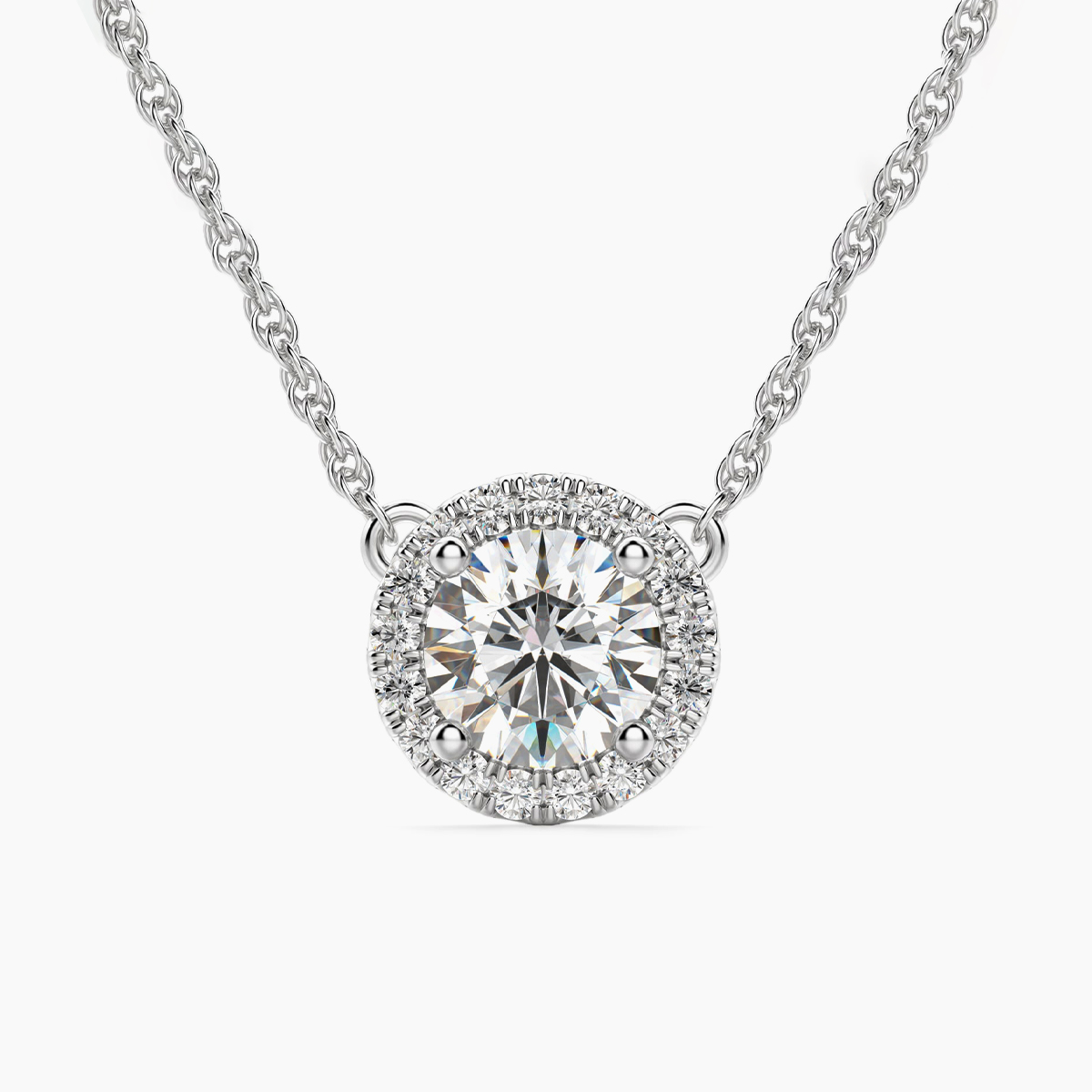 prong solitaire pendant with platinum metal and round shape diamond