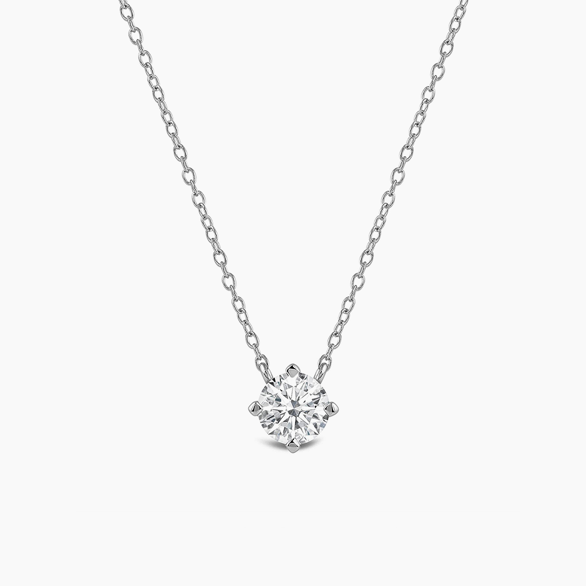 prong solitaire pendant with platinum metal and round shape diamond