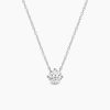 prong solitaire pendant with platinum metal and round shape diamond