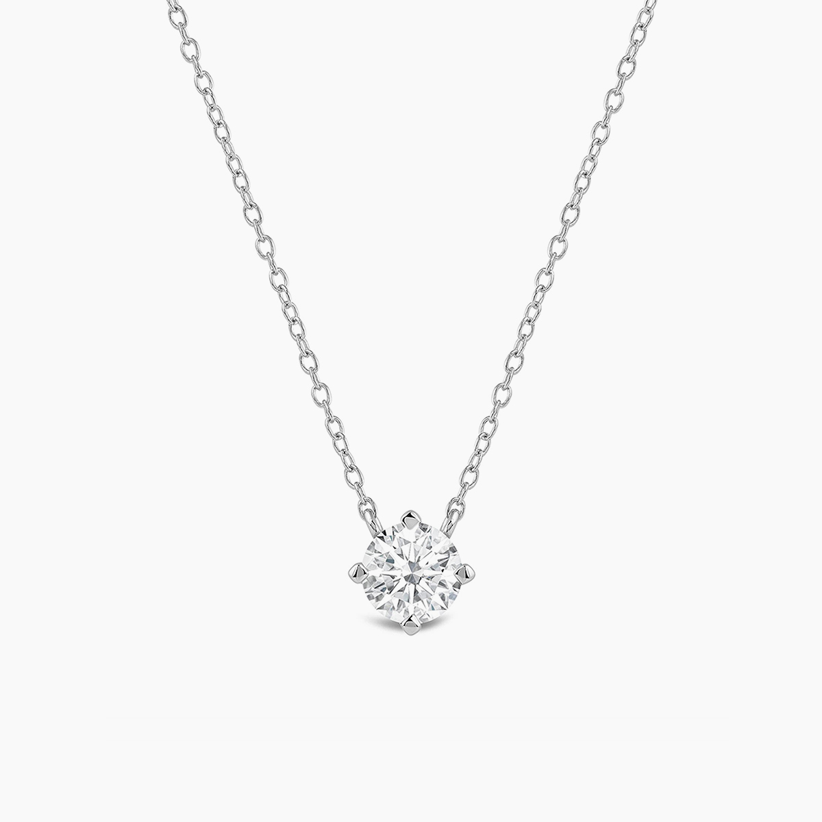 prong solitaire pendant with platinum metal and round shape diamond